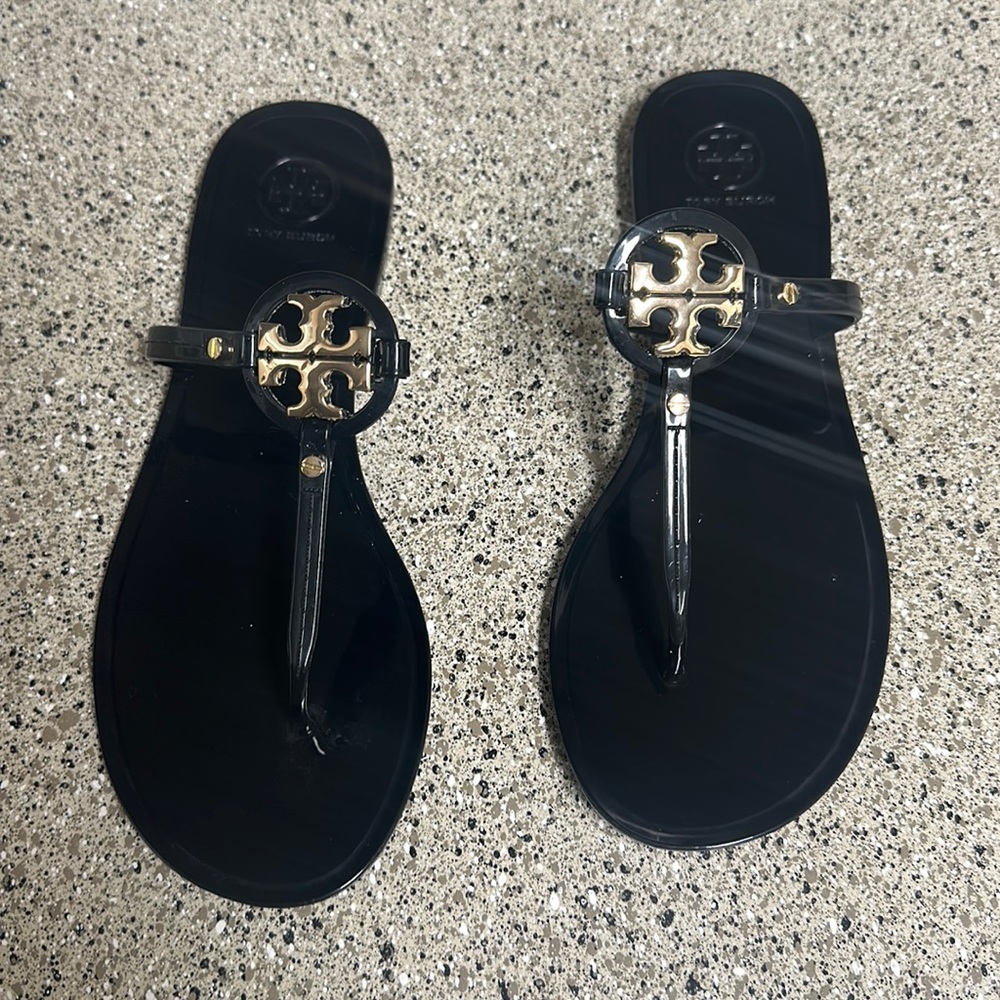 Tory Burch jelly sandals.